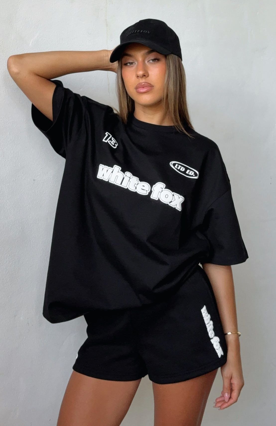 white fox black shorts